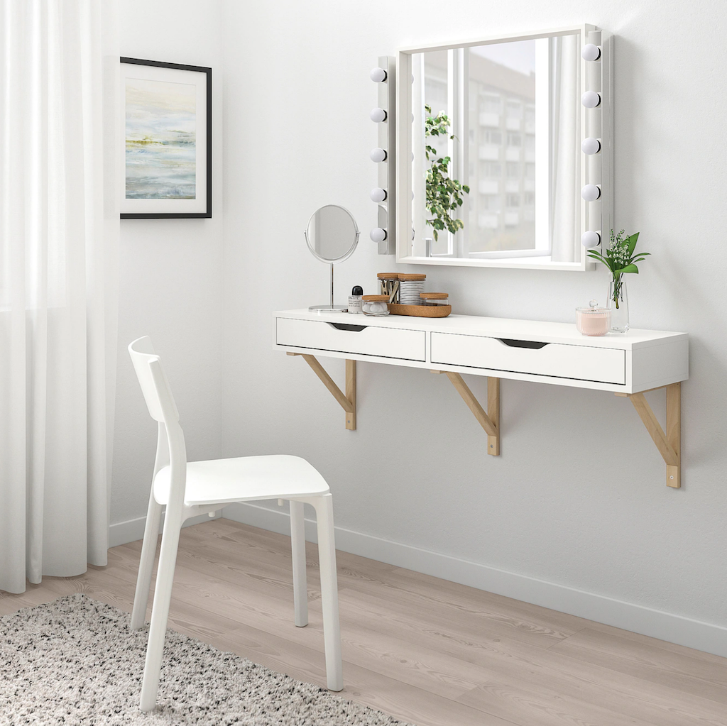 IKEA vanity wall shelf with chair and lighted mirror